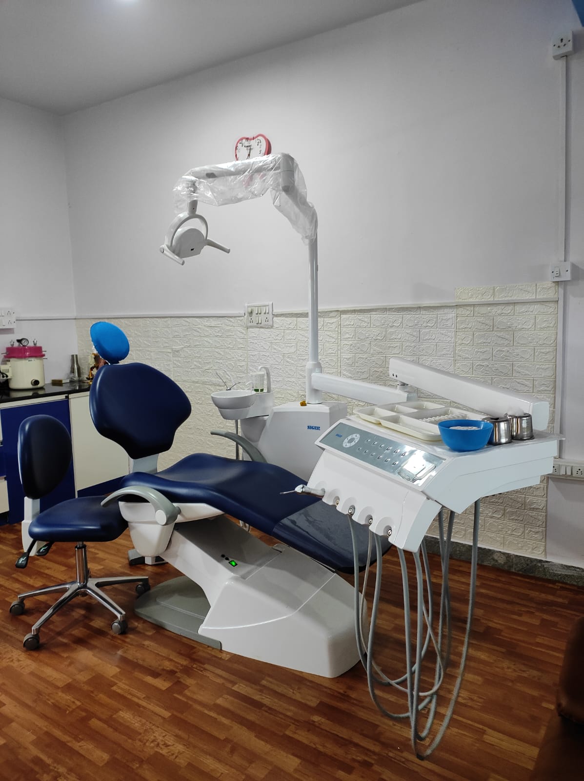 Dental chair and modern equipment at Dentapex